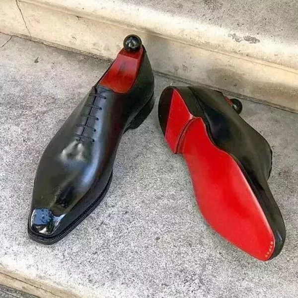 Classic red-soled Oxford shoes